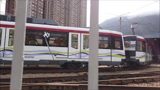 輕鐵第五期列車1133+1211駛離輕鐵車廠檢修車間