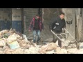 syria army civilians reclaim ruined aleppo streets