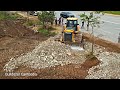 This is a big make new roads for truck activity, Processing by bulldozer SHANTUI DH17C2, Dump truck