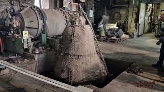 Extraction from the casting pit of a large bell in the Pontifical Marinelli Bell Foundry in Agnone