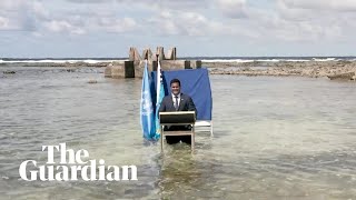 'We are sinking': Tuvalu minister gives Cop26 speech standing in water to highlight sea level rise