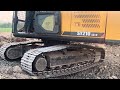 sany 210 excavator hard rock coting work