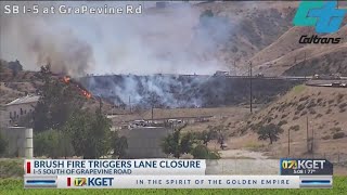 Brush fire triggers lane closure south of Grapevine Road