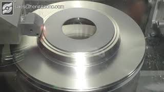 Roughing and finishing lathe for brake disc.