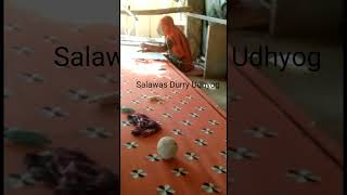 Man and Woman Together Making Rugs in Salawas Durry Udhyog