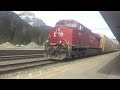 sister units canadian pacific 8948 leads cp 112 at banff national park ab