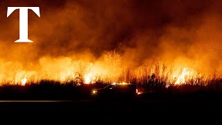 Massive new wildfire strikes Southern California