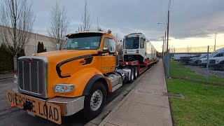 MAX 111 On a Flatbed Truck at Ruby Junction MAX Yard