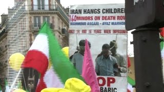 Hundreds in Paris protest Iranian president's visit to France