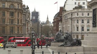 Central London quiet as COVID-19 precautions kick in across the UK | AFP