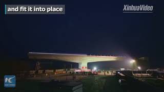 Chinese engineers rotate 12,000-ton bridge 90 degrees in 1 hour to fit it into place