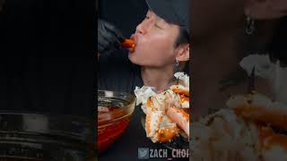 king crab legs in seafood boil sauce