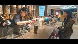 How they make special milk tea in Comebuy Tea Shop in Hong Kong