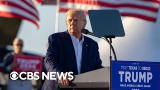 Donald Trump, awaiting New York grand jury decision, attacks investigations at campaign rally