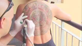 Complete Aztec Calendar Tattoo On Girl Single Needle