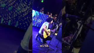 Chris Martin jamming on his guitar (2020)