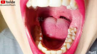 Girl with beautiful mouth, lipstick and teeth, chewing a chewy candy with her molars tongue uvula