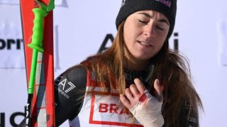 Sofia Goggia wins World Cup downhill in St Moritz despite two broken fingers.