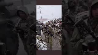 Russian infantry battalion in Kiev's outskirts march in the cold weather.