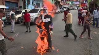 Maduro and Trump effigies set ablaze in Venezuela Easter ritual