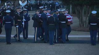 Jimmy Carter's casket taken into hometown church for final funeral service