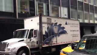 Iron mountain truck polluting environment while shredding paper in