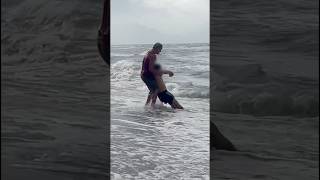 Impressive Rescue By a Member Of The Lifeguard Rescue Team at The Beach