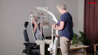 Molift Mover 180 - Elderly couple with woman lifting husband from armchair