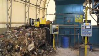 MDAPP two ram baler baling municipal waste.mp4