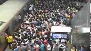 You thought your commute was bad! Beijing's crowded trains