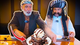 Tribal People Experience Brownie In a Cafe