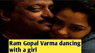 Ram Gopal Varma's video dancing with a girl goes viral on social media |   राम गोपाल वर्मा का वीडियो