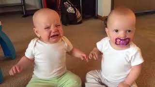 Copy of Twin baby girls fight over pacifier   YouTube