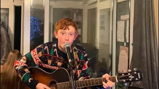 Mary’s Boy Child by Boney M - Charlie (and his family “band”) sings and plays guitar