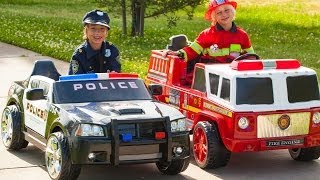 Power Wheels Race - Policeman (Sidewalk Cop) vs Fireman!