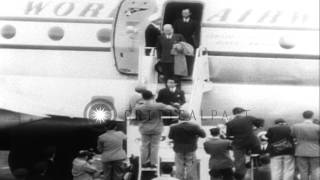 People greet Prince Akihito at the airport in Japan after his return from world t...HD Stock Footage