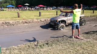 Silver truck Crisfield mud bog