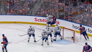 Jake McCabe LEVELS Hyman into the boards