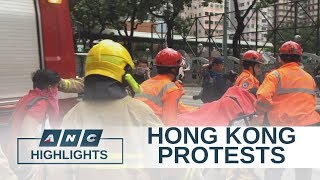 Filipino in Hong Kong collapses as anti-riot police fire tear gas