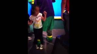 Alyssa doing the Cupid shuffle at chuck e cheese
