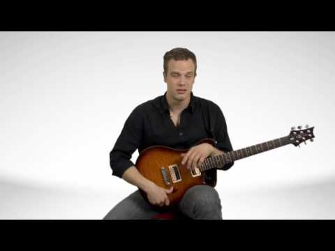 How To Hold An Electric Guitar - Guitar Lessons How To Hold An Electric Guitar - Guitar Lessons