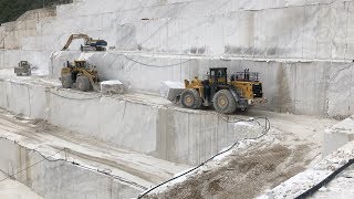 Huge Wheel Loaders Komatsu WA900 And WA800 With Caterpillar 775E Working On Birros Marble Quarries