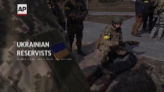 Ukrainian reservists stand by to fight
