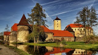 Drone view of the medieval gothic water castle in the town of Švigov in the Czech Republic.