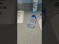 Aquafina water bottle falling over