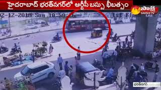 Hyderabad Accident : Two die after being hit by RTC bus | Sakshi TV