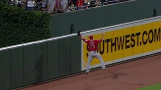 LAA@BAL: Trout jumps at the track to get the out