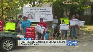 Protesters gather at judge's home