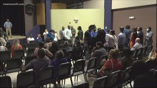 Community discussion cut short as tensions rise following viral arrest video