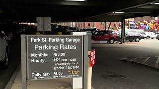It's now cheaper to park at Lewiston garages, but old signs cause confusion